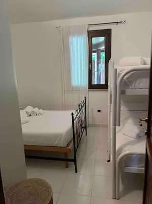 Letto o letti in una camera di Vacanze a pochi passi dal mare