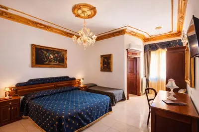 Letto o letti in una camera di Euro Hotel Iglesias