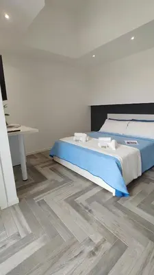Letto o letti in una camera di Stanza idromassaggio 2
