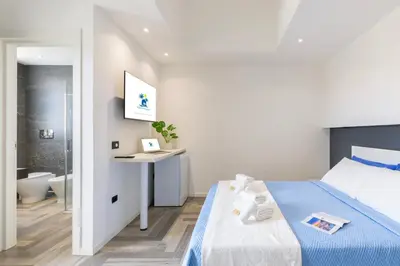 Letto o letti in una camera di Stanza idromassaggio 2