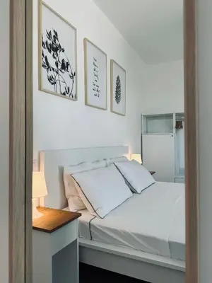 Letto o letti in una camera di Villa Noga Rooms