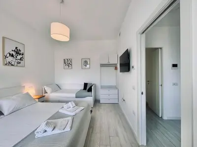 Letto o letti in una camera di Villa Noga Rooms