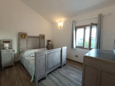 Letto o letti in una camera di La casa di Rubin
