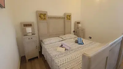 Letto o letti in una camera di La casa di Rubin