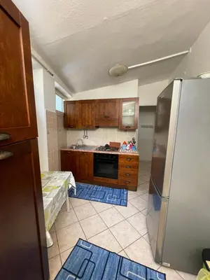 Cucina o angolo cottura di Casa vacanze a 80 m dal mare, Su Guventeddu IUN R4654