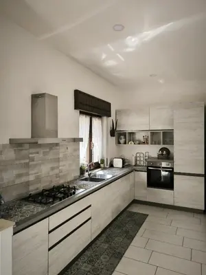 Cucina o angolo cottura di Bidda Mores Appartamenti- I Velieri