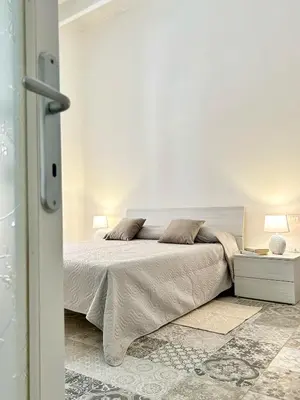 Letto o letti in una camera di Tuna House