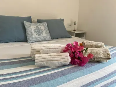 Letto o letti in una camera di Villa Margiu