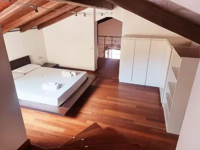 Letto o letti in una camera di Casa Ginevra