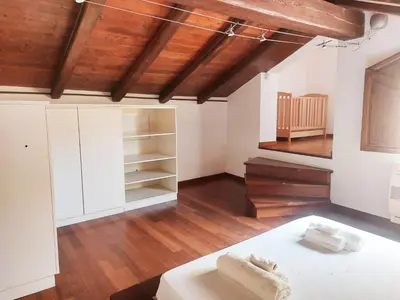Letto o letti in una camera di Casa Ginevra