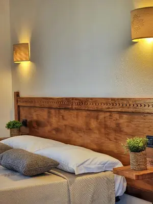 Letto o letti in una camera di Domos de Ammentos