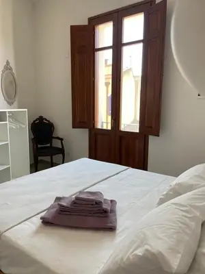 Letto o letti in una camera di Dimora Taturì