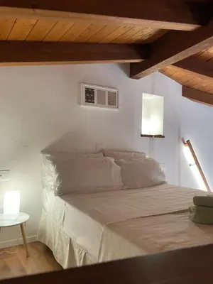 Letto o letti in una camera di Dimora Taturì