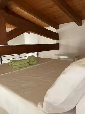 Letto o letti in una camera di Dimora Taturì