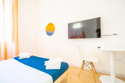 TV o dispositivi per l'intrattenimento presso Sunscape Rooms Cagliari City Center