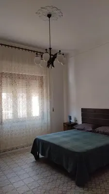 Letto o letti in una camera di La Stazione