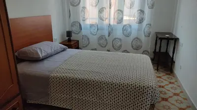 Letto o letti in una camera di La Stazione