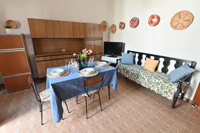 Area soggiorno di IzzHome Coloniale
