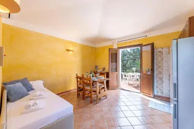 Letto o letti in una camera di ISA-Baia delle Palme residence