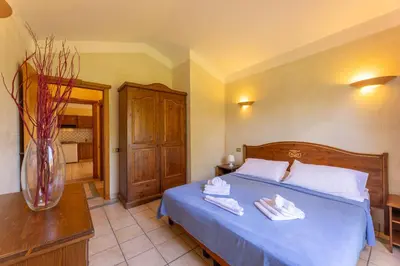 Letto o letti in una camera di ISA-Baia delle Palme residence