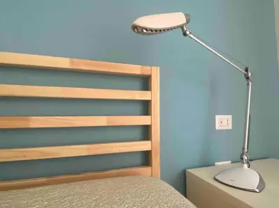 Letto o letti in una camera di Tuvixeddu Apartment - Cagliari