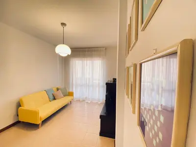 Area soggiorno di Tuvixeddu Apartment - Cagliari