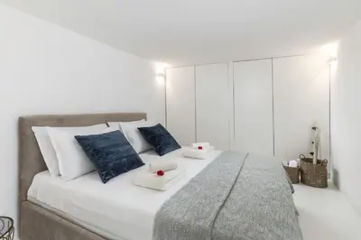 Letto o letti in una camera di Casa Vacanze nel Cuore di Cagliari