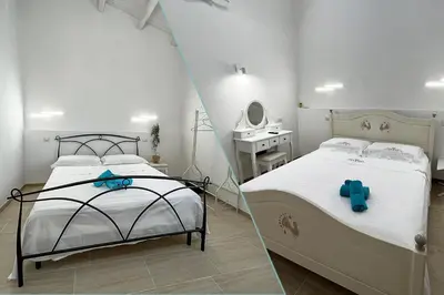 Letto o letti in una camera di B&B Dimora Orrù