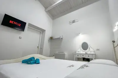 Letto o letti in una camera di B&B Dimora Orrù