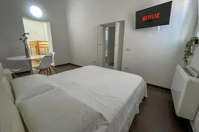 Letto o letti in una camera di B&B Dimora Orrù
