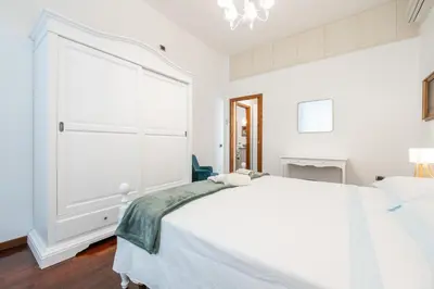 Letto o letti in una camera di Greta House San Benedetto