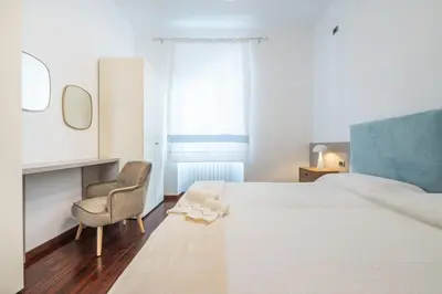 Letto o letti in una camera di Greta House San Benedetto