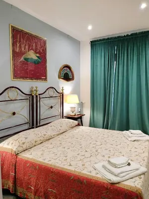 Letto o letti in una camera di La casa dei ricordi