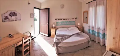 Letto o letti in una camera di Meravisola Costa Rei Holiday Rooms