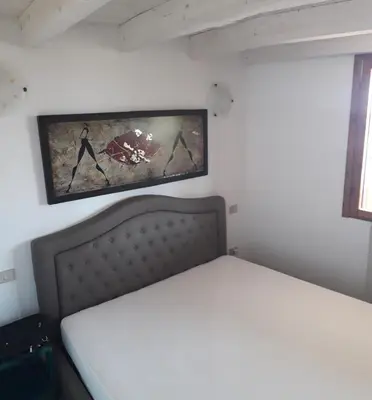 Letto o letti in una camera di Meravisola Costa Rei Holiday Rooms