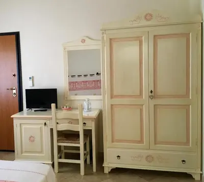 TV o dispositivi per l'intrattenimento presso Meravisola Costa Rei Holiday Rooms