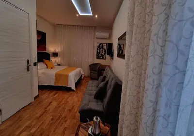Letto o letti in una camera di Vi Ja Villa Janas Cagliari Resort