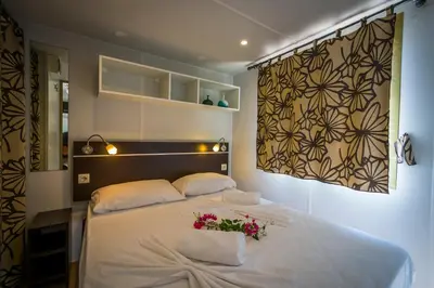 Letto o letti in una camera di Tiliguerta Glamping&Camping Village