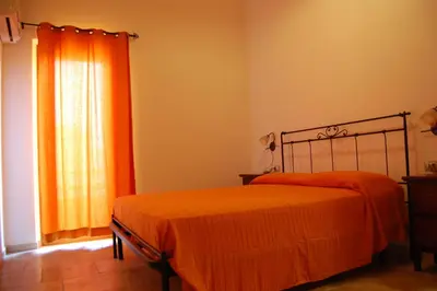 Letto o letti in una camera di L'Agave