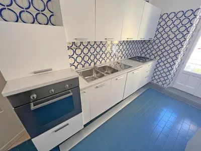 Cucina o angolo cottura di Camere in Centro