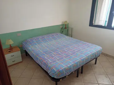 Letto o letti in una camera di Casa di Nanni