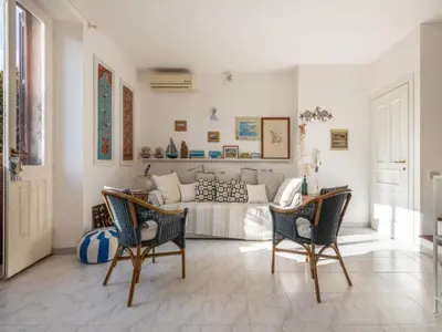 Area soggiorno di Apartment L'appartamento nel Corso by Interhome
