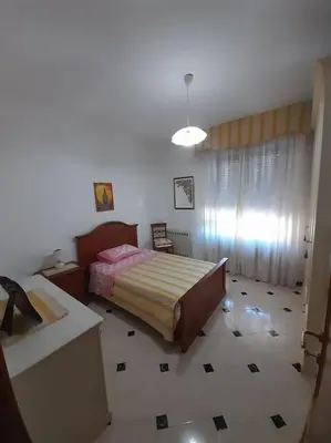 Letto o letti in una camera di appartamento in casa Lai
