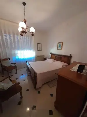 Letto o letti in una camera di appartamento in casa Lai