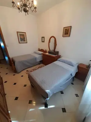 Letto o letti in una camera di appartamento in casa Lai