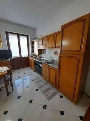 Cucina o angolo cottura di appartamento in casa Lai
