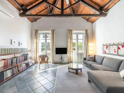 Area soggiorno di Meigama, loft with parking in historic center
