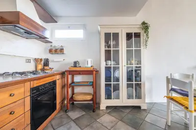 Cucina o angolo cottura di Meigama, loft with parking in historic center