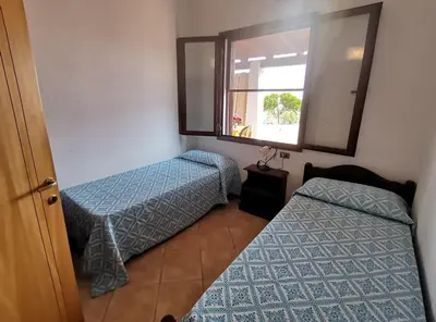 Letto o letti in una camera di Villetta a 500metri dal mare con bellissima vista