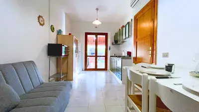 TV o dispositivi per l'intrattenimento presso Casa Ambra - Villetta con vista, giardino e BBQ